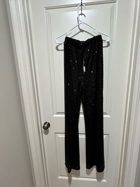 Fashion Nova women’s size M After Glow Black Sequin Flare Pants. NWT.  Lined